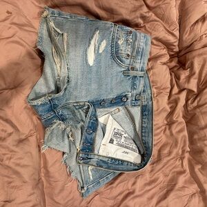 Distressed Light Blue Levi Shorts